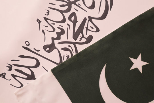 Concept showing of Pakistan and Taliban deal preocess showing with flags.