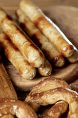 Close-up grilled sausages with pretzels