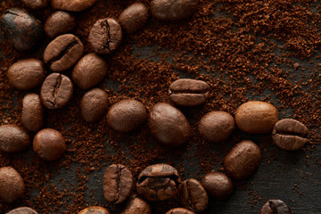 Aromatic roasted coffee beans mixed with ground coffee