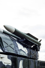 Anti-aircraft missile system. Green army vehicle. Close up view