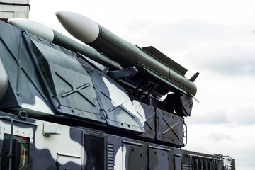 Anti-aircraft missile system. Green army vehicle. Close up view