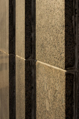 Paving slabs in shade from sun. Cityscape close-up view