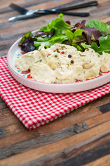 Traditional Parmentier of fish with chives
