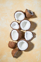 Obraz na płótnie Canvas Ripe coconuts on color background