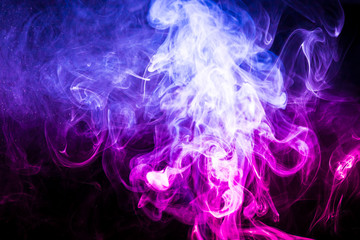 Colored smoke on black background