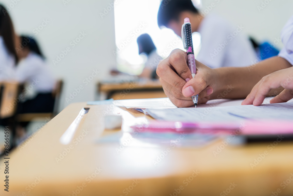 Wall mural education uniform students testing exam with pencil for multiple-choice quizzes or testing exams ans