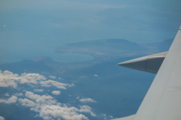 Fototapeta na wymiar View from the plane to the coastal part and sea