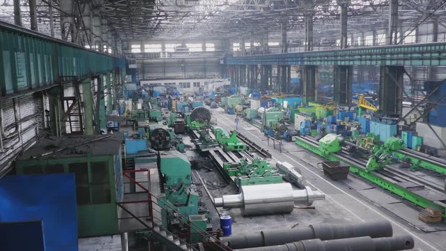 Workshop for preparing rolls. Machining of machine parts. Rolling forming rolls metal works on manufacture of pipes. Rolling mill machine for rolling steel sheet.