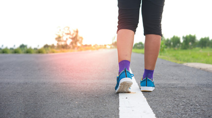 Close up of female jogging shoe in a park.