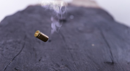 Close up 9mm gun shell  after shooting.