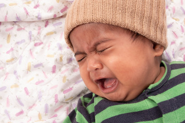 Cute asian baby sad and crying