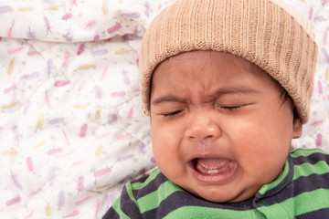 Cute asian baby sad and crying
