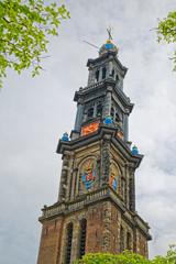 Fototapeta na wymiar Amsterdam Westerkerk clock tower in spring time