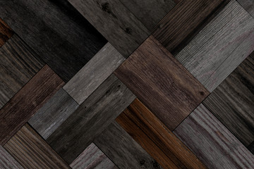 Wood texture for background. Dark parquet floor with abstract pattern.	