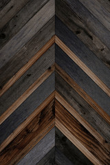 Wooden boards texture. Dark parquet with geometric pattern. Dark wood texture for background.