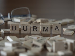 The country name Burma represented by wooden letters