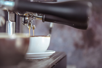 Espresso pouring from coffee machine, Coffee on espresso machine, Coffee from professional coffee machine 