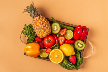 Fruits and vegetables rich in vitamin C in box.