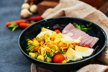 Fresh fruits salad and ham with egg