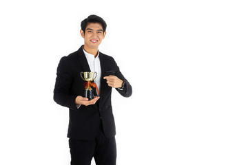 Obraz na płótnie Canvas Handsome young businessman Asian caucasian wear a black suit with black hair, be a smile and standing smart poses. Hold a trophy. On a white background.
