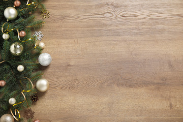 Festive Christmas decoration on wooden background, flat lay. Space for text