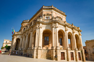 Fototapeta na wymiar Panoramic view of the Baroque Palazzo Ducezio in the historic center of Noto, in Sicily Italy.