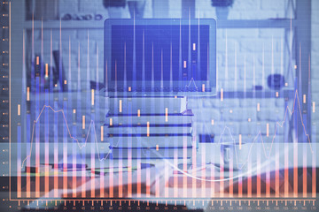 Financial graph colorful drawing and table with computer on background. Double exposure. Concept of international markets.