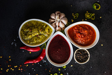 Variety of traditional georgian satsebeli sauces