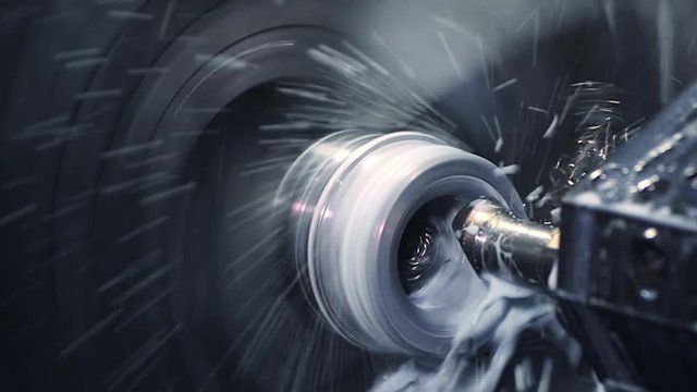 Slow Mo. CNC Milling operation on the sample work pieces. Milling machine cutting the part. High pressure coolant a great option for chip removal and evacuation as it blasts the chips away