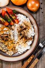 Grilled pork chop with white rice and mushroomson 
