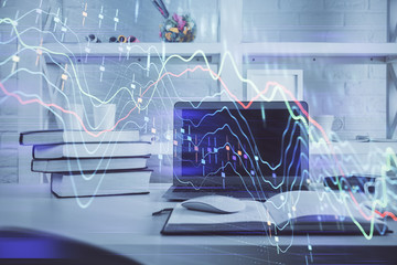 Stock market chart hologram drawn on personal computer background. Double exposure. Concept of investment.