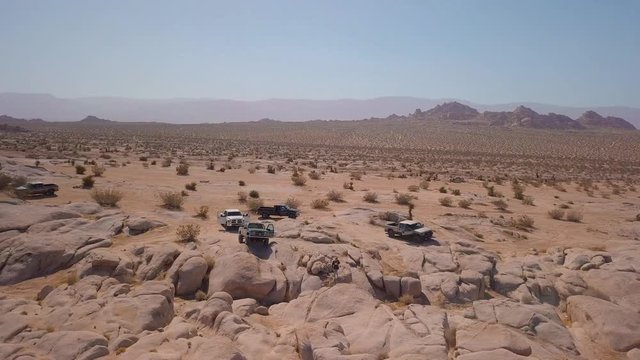 Trucks Off-Roading in Rocks
