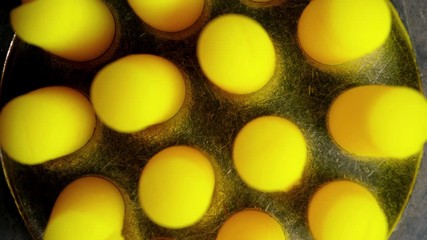 Grinder grinds the abstract paste.