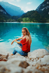 Outdoors portrait of beautiful young girl laughing