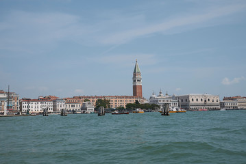 Fototapeta premium Venice, Italy - July 02, 2019 : View of Piazza San Marco and palazzo Ducale from the ferry boat