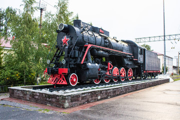 Fototapeta na wymiar Monument Locomotive Pobedy L-2248 in Murom Russia