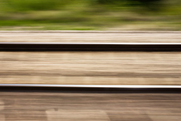 image of the tracks of a train that is going at high speed 
