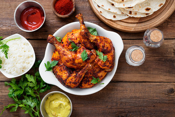 Tandoori chicken with jasmine rice and pita bread, indian cuisine.