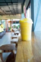 Mango smoothie or mango yogurt smoothie glass