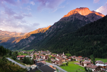 Aerial view of the town of Feichten in the Kaunertal valley (austrian alps) at sunset