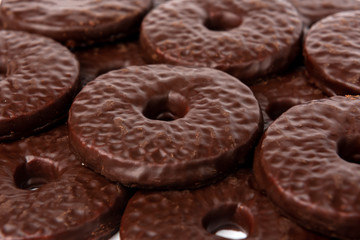 Shortbread cookies in chocolate glaze isolated on white background.