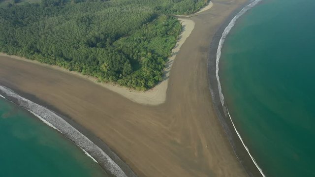 Aerial Drone View of the beach next to the Whale's Tail at the Marino Ballena National Park in Uvita, Costa Rica
