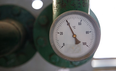 Temperature gauge, celsius scale, old, dial, blur industrial background