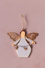 Christmas vintage ornament on a dust pink backdrop