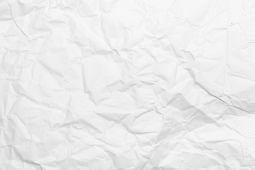 White crumpled paper texture background.