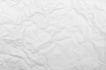 White crumpled paper texture background.