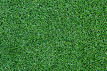 Obraz premium Green artificial grass pattern and texture for background.