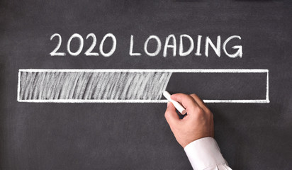 New Year Business Concept. 2020 Loading, on Blackboard