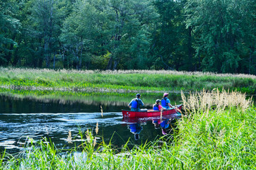 Back View of Canoers in River at Kejimkujik National Park Nova Scotia Canada