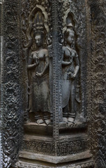 Historic bas-reliefs of Apsara Deva on wall of Ta Prohm Temple at Angkor Wat temple, Siem Reap, Cambodia. UNESCO World Heritage Site. 